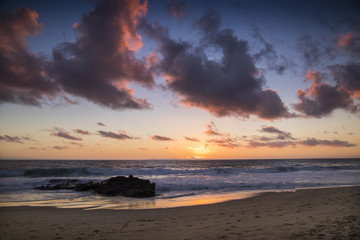 Fototapeta na wymiar Clouds roll in over Laguna Beach, California during a beautiful Southern California sunset.