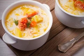 Salmon soup. Two bowls of creamy salmon fish soup. Clean eating, healthy and diet food concept
