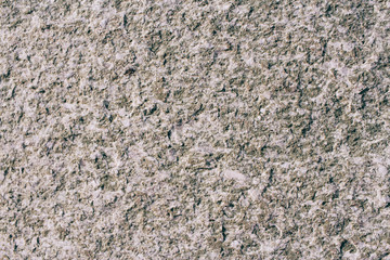 The texture of natural gray granite. Copy space stone background.