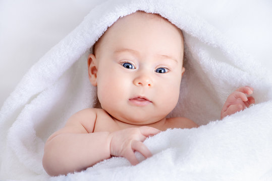 adorable baby in towel