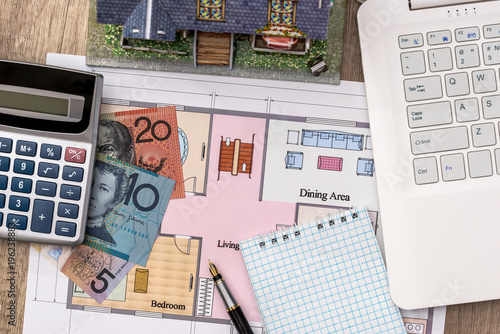 Laptop With House Plan Australian Dollar Pen And Calculator Stock Laptop With House Plan Australian Dollar Pen And Calculator