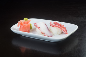 japanese cuisine. sushi octopus on the background