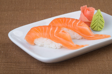 japanese cuisine. sushi salmon on the background