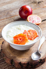 Milk rice porridge with blood orange