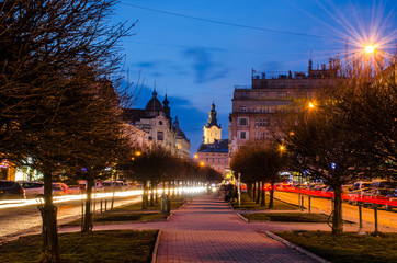Scenic night Lviv cityscape architecture on the long exposure
