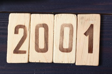 Retro wooden figure year 2001