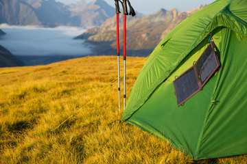 expedition in mountains with a tent
