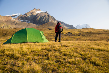 expedition in mountains with a tent
