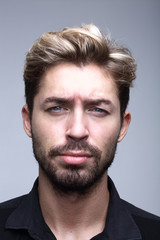 Fototapeta premium thoughtful businessman holding his hand under his chin