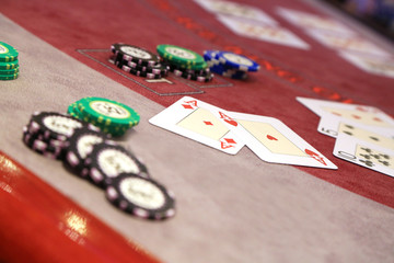 Playing cards and chips on casino table