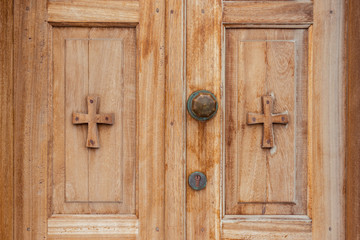 Closeup of wooden door of Greek church. Zakynthos island, Greece