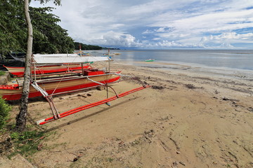 Balangay or bangka boats ashore. Punta Ballo beach-Sipalay-Philippines. 0298