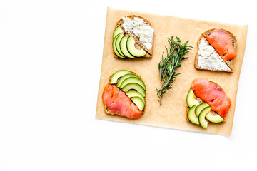 fitness breskfast with homemade sandwiches on white background top view mockup