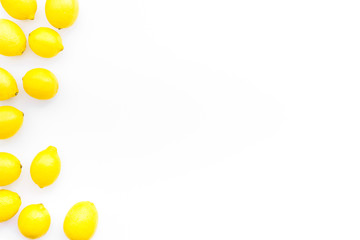 citrus mockup with yellow lemons on white background top view