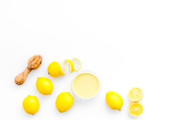 healthy sweet curd cooking with lemons on kitchen white background top view mock up