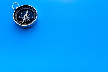 Direction concept with compass on blue background top view mockup