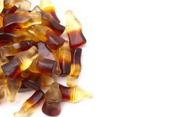 Cola Flavored Gummies on a White Background