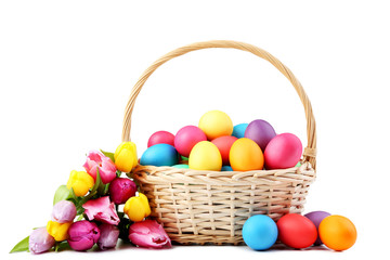 Colorful easter eggs in basket with tulips isolated on white