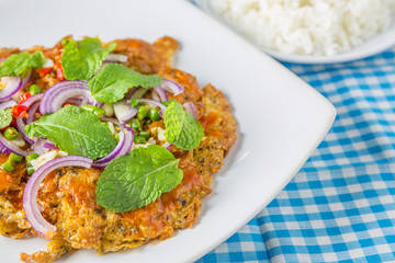 canned fish omelette and rice on table, thai food