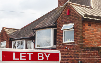 To Let sign outside house