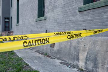 caution tape yellow sections off an area for safety restriction access