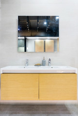 Interior of bathroom with sink basin faucet and mirror. Modern design of bathroom
