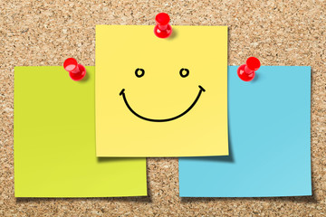 Cork board with smile sticky notes