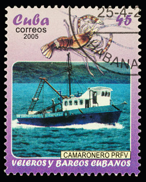 Fishing ship and lobster on postage stamp