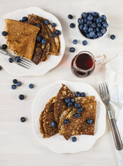 Crepes with blueberries and maple syrup