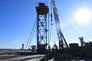 field oil workers at work