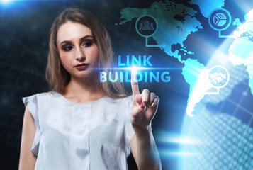 The concept of business, technology, the Internet and the network. A young entrepreneur working on a virtual screen of the future and sees the inscription: Link building