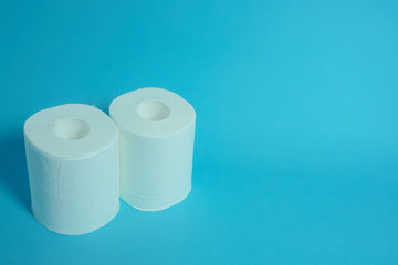Daily necessities, Toilet paper. copy space, blue background.　日用品　トイレットペーパー　青色背景