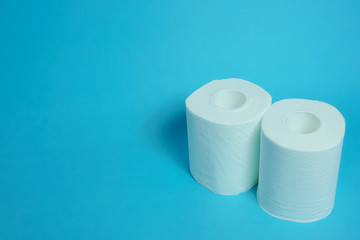 Daily necessities, Toilet paper. copy space, blue background.　日用品　トイレットペーパー　青色背景