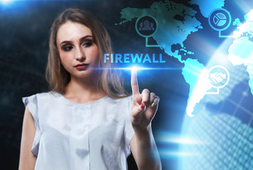 The concept of business, technology, the Internet and the network. A young entrepreneur working on a virtual screen of the future and sees the inscription: Firewall