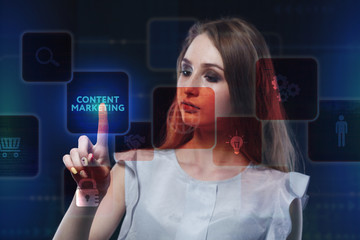 The concept of business, technology, the Internet and the network. A young entrepreneur working on a virtual screen of the future and sees the inscription: Content marketing