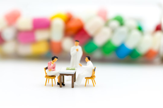 Miniature people: Annual Health Check with the doctor. Image use for Health check concept.