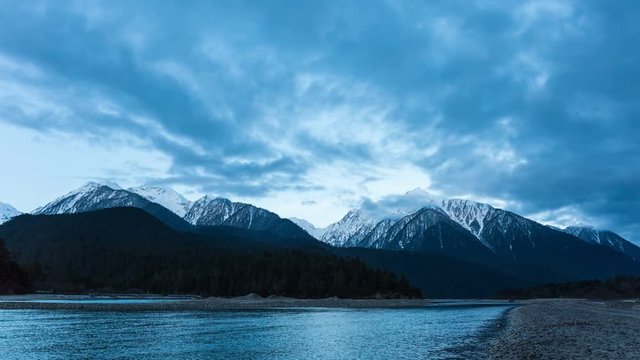 time lapse of the snow mountain and river in bomi county, beautiful natural scenery of tibet.