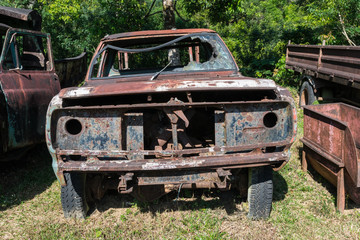 The rusty old car of Pilok old mining in E-Thong village, Pilok,Thong Pha Phum National Park, Kanchanaburi province, Thailand.