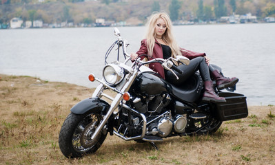 Fototapeta na wymiar Pretty biker woman outdoor 
