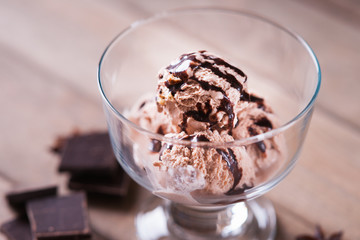 Ice cream sundae, spices and chocolate pieces 