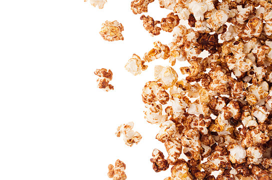 Sweet Chocolate Popcorn As Decorative Border With Copy Space, Isolated. Fast Food Background, Top View.