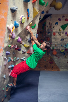 Rock climbing in the gym.