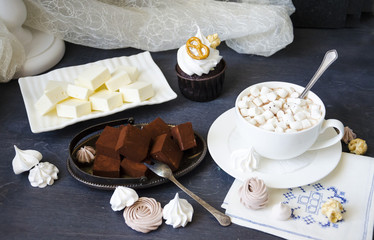 Chocolate cake and other sweets with salted caramel and bird’s milk