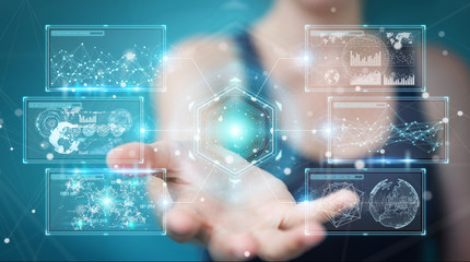 Businesswoman using digital screens interface with holograms datas 3D rendering