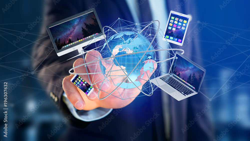 Poster businessman holding a computer and devices displayed on a futuristic interface with international ne