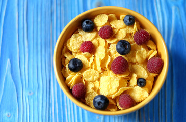 Cornflakes and different Berries - Blueberries and fresh Raspber
