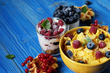 Healthy breakfast. Corn flakes with raspberries and blueberries,