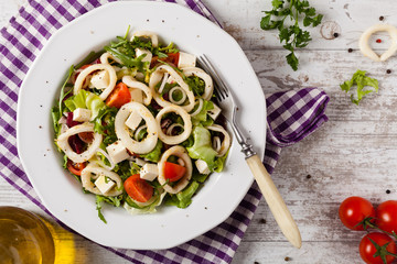 Salad with squid rings.