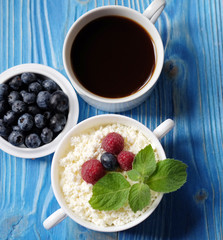 Russian cottage cheese with berry and mint, blueberries and coff