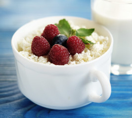 Russian cottage cheese with berry and mint, blueberries and coff